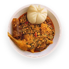 A bowl of jollof rice with a boiled dumpling on top