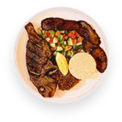 A plate of grilled meat with sides